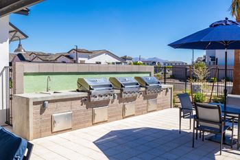 the preserve has an outdoor kitchen with two grills
